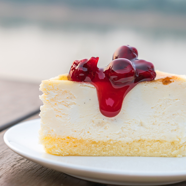 Slice of cheesecake with cherry topping