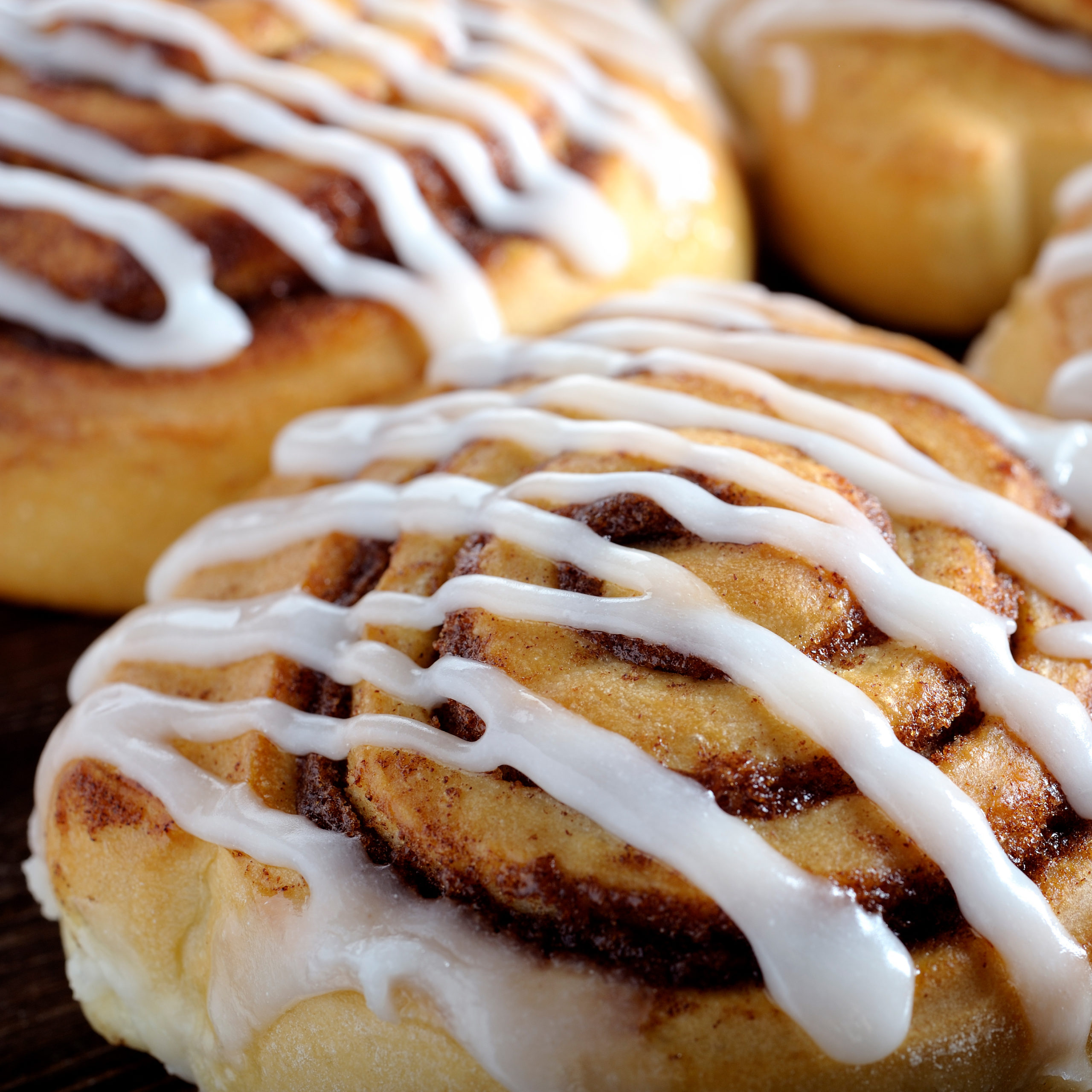 cinnamon rolls with frosting drizzle