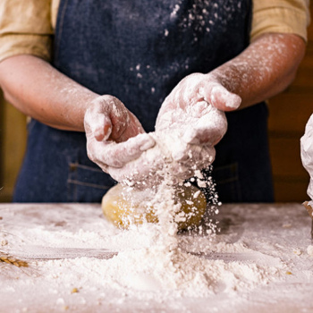 person making dough