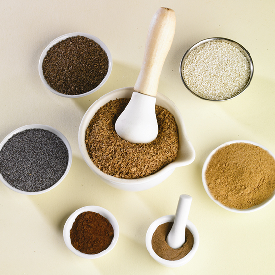 an assortment of spices in bowls