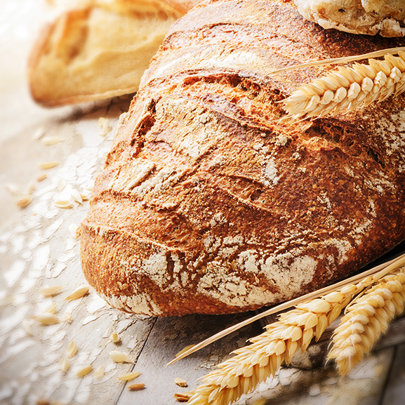 Loaf of bread with wheat