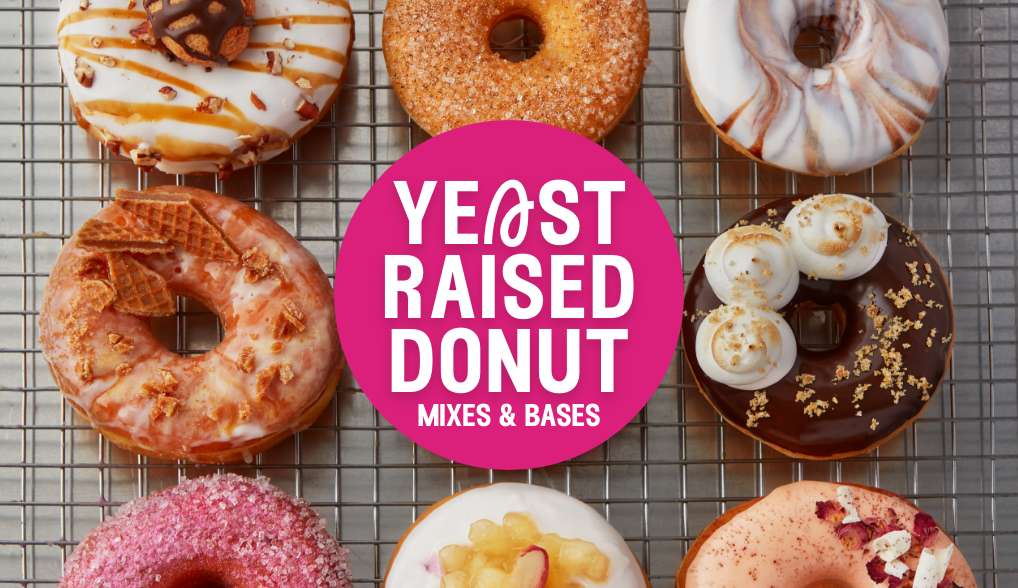 Text saying Yeast Raised Donut: Mixes & Bases with an image of various glazed donuts on a cooling rack